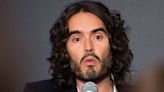 Katharine McPhee Addresses Resurfaced Clip Of Russell Brand Bouncing Her On His Lap