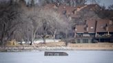 Fish house breaks through ice into Prior Lake, refreezes in place