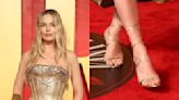Standout Shoes at the 2024 Vanity Fair Oscars Party: Margot Robbie’s Manolo Blahnik Sandals, Florence Pugh’s Sheer Louboutins and More