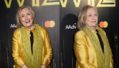 Hillary Clinton Sartorially Channels the Yellow Brick Road in Gold Coat for ‘The Wiz’ Revival Premiere on Broadway