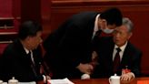 Former Chinese leader Hu Jintao escorted out of CCP ceremony