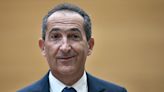Billionaire Drahi Tightens Grip on BT, Building Stake to 25%