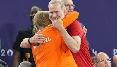 King Felipe of Spain hugs gleeful Princess Amalia of the Netherlands