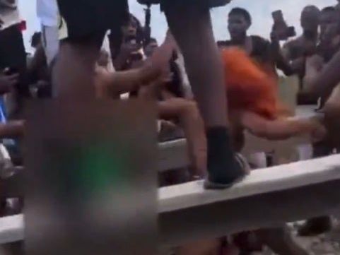 Popular Georgia beach town overrun by 'Orange Crush' fighting, chaos, video shows