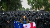 Protesters throng main streets of Georgia's capital after parliament passes so-called 'Russian law'