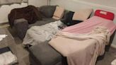 We're forced to sleep in living room on makeshift bed with kids - we need help