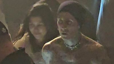 Travis Barker and Kourtney Kardashian put on amorous display