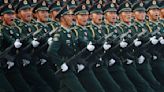 China drops 'peaceful reunification' reference to Taiwan; raises defence spending by 7.2%