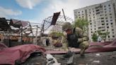 Russian missiles kill 7 in Ukraine's second-largest city as Moscow's troops press offensive