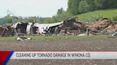 Assessing the damage and cleaning up after tornadoes hit Winona County