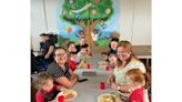 Nursery pupils get a taste of school life with special lunch