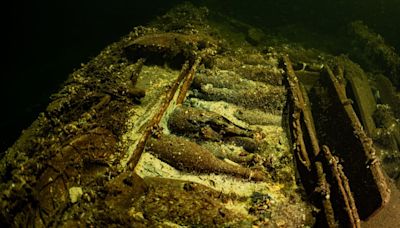 Divers find 19th-century shipwreck laden with unopened bottles of champagne and precious mineral water