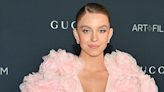 Sydney Sweeney's ocean-blue fishnet naked dress is *beyond* epic