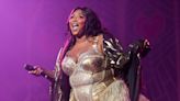 Lizzo protests Tennessee law by bringing drag queens on stage at her Knoxville show