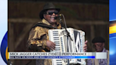 Mick Jagger watches Zydeco legend Nathan “Big Nate” Williams Sr. perform at Jazz Fest