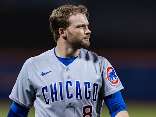 Watch: Ian Happ, Cubs win on controversial double play vs. Mets