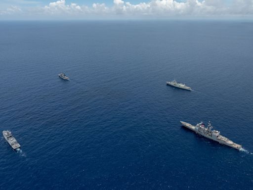 Chinese warships shadow U.S. and allies in South China Sea