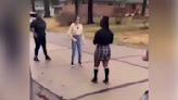 A girl is in critical condition after a fight caught on video shows another girl slamming her head to the ground repeatedly