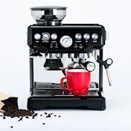Grinds whole coffee beans before brewing Can be programmed to start brewing at a specific time Brews a fresh and flavorful cup of coffee Requires regular cleaning of the grinder