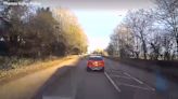 Driver deliberately brakes and swerves in front of ambulance on emergency call