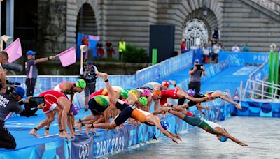 Olympic swimmers are guzzling cans of Coke to protect from bacteria in the Seine