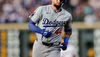 Dodgers stun Rockies with seven-run ninth inning