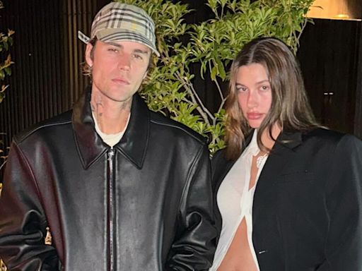 Justin Bieber Kisses Pregnant Wife Hailey While Holding Baby Bump