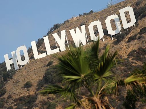 Hollywood workers union reaches pay, AI-use deal with top studios