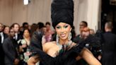Cardi B Nearly Covers the Entire Red Carpet With Her Billowing Black Gown at 2024 Met Gala