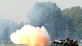 Queen Elizabeth II remembered a year after her death as gun salutes ring out for King Charles III