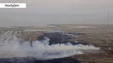 Lava reaches wall around US military site in Iceland, but defenses expected to hold