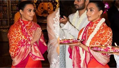 Kim Kardashian blends contemporary style with ethnic grace in red maxi dress and Manish Malhotra-designed dupatta; Look decoded