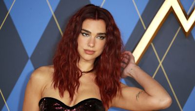 Dua Lipa dishes on her love for the gays, learning tough lessons & 'picking herself up'