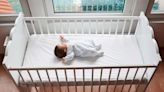 New infant sleep guidelines advise against hats and weighted swaddles, blankets