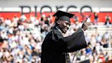 Pierce College class of 2024 graduates at Shepard Stadium with hugs and cheers