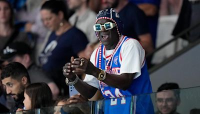 Flavor Flav meets with FLOTUS Jill Biden during US women’s water polo match