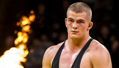 Ben Kueter to temporarily step away from Iowa football to focus on wrestling, will return in 2025