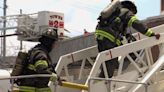 Nashville firefighters working to beat the heat as they contain recycling plant fire