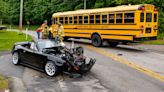 Driver freed by firefighters after colliding with school bus near Spring Grove