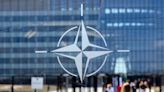 Finnish NATO Entry Lowers Country Risk for Investors, Rehn Says