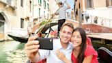 Selfies are more lethal than shark attacks. Should more tourist destinations ban them?
