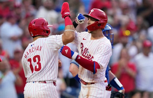 Turner hits grand slam, Wheeler exits with back stiffness in Phillies' 10-1 win over Dodgers