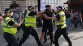 Dozens arrested as disorder continues, with fears of more violence to come