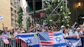 ‘Bring them home’ chants replace usual festive mood at New York’s annual parade for Israel