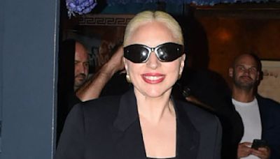 Lady Gaga blows a kiss to her fans following a night out in Paris