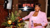 Niecy Nash Swaps Metallic Pumps for Platform Sneakers at Netflix’s ‘Holigays’ Party