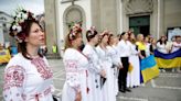 Ukrainian refugees sing Beethoven's 'Ode to Joy' near Swiss summit