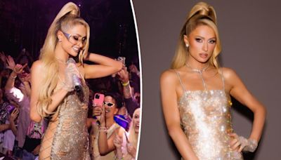 Paris Hilton is the ‘It Girl blueprint’ in laced-up sequined dress while previewing new album