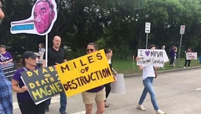 Houston ISD parents protest amid district-wide job cuts, campus leadership changes | Houston Public Media