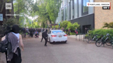 Man drives car towards crowd at Portland State University, uses pepper spray - CNN Video